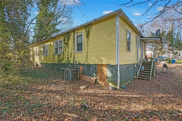 view of home's exterior featuring central AC