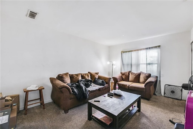 living room featuring dark carpet