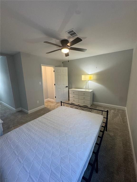 bedroom with ceiling fan and carpet