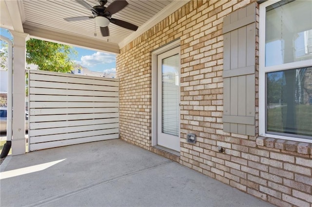 view of patio / terrace featuring ceiling fan