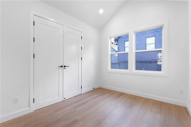 1247 Bridges Ave SW Unit A, Atlanta, GA 30310 - unfurnished bedroom featuring light wood-style flooring, baseboards, lofted ceiling, and recessed lighting