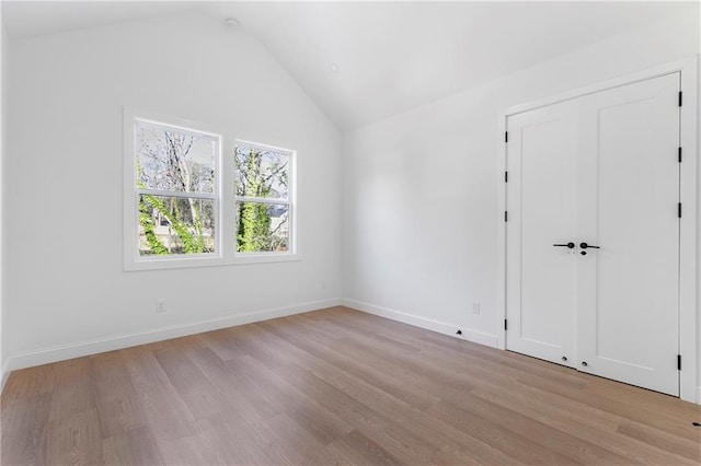 1247 Bridges Ave SW Unit A, Atlanta, GA 30310 - spare room featuring lofted ceiling, light wood finished floors, and baseboards