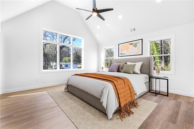 1247 Bridges Ave SW Unit A, Atlanta, GA 30310 - bedroom with high vaulted ceiling, light wood finished floors, recessed lighting, baseboards, and ceiling fan