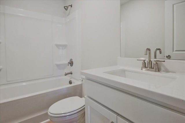 full bathroom featuring shower / bathing tub combination, vanity, and toilet