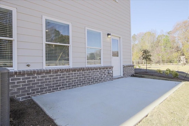 view of patio featuring central AC unit