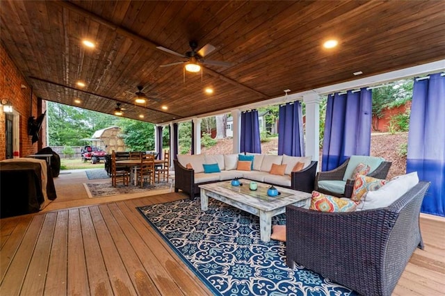 exterior space with ceiling fan and an outdoor hangout area