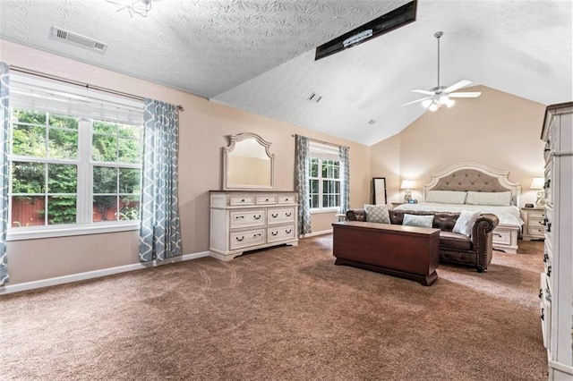 carpeted bedroom featuring a textured ceiling, lofted ceiling, and ceiling fan