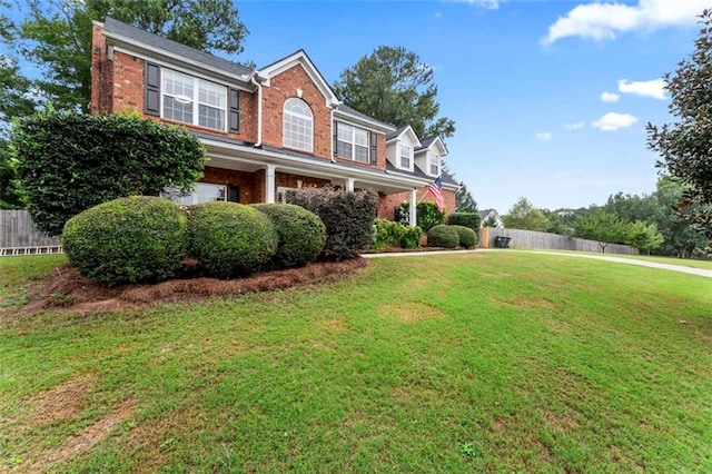 view of front facade featuring a front yard