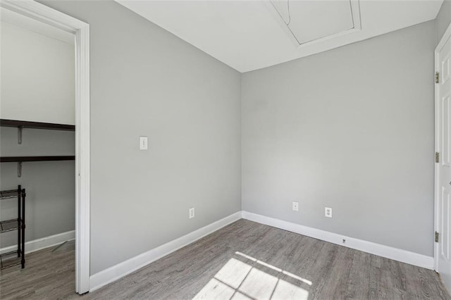 unfurnished bedroom featuring light wood-type flooring