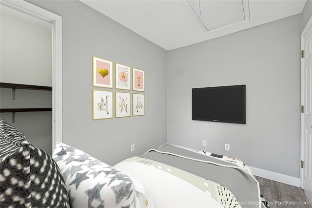 bedroom featuring wood-type flooring