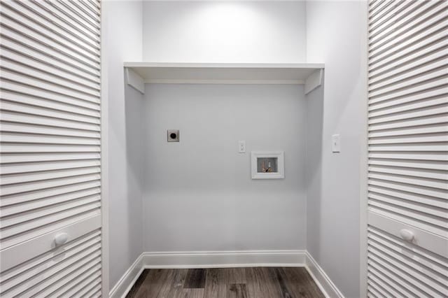 clothes washing area with electric dryer hookup, washer hookup, laundry area, baseboards, and dark wood-style flooring