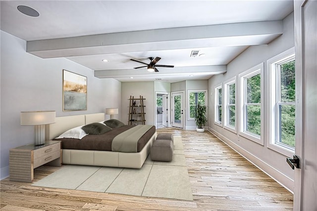 2110 Fairway Cir NE, Brookhaven, GA 30319 - bedroom with baseboards, beam ceiling, light wood-type flooring, and access to exterior