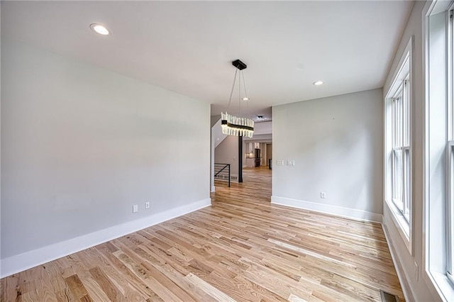 2110 Fairway Cir NE, Brookhaven, GA 30319 - empty room featuring baseboards, light wood-style flooring, and recessed lighting