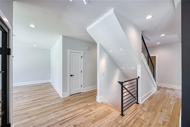 2110 Fairway Cir NE, Brookhaven, GA 30319 - hall with light wood-style flooring, baseboards, an upstairs landing, and recessed lighting