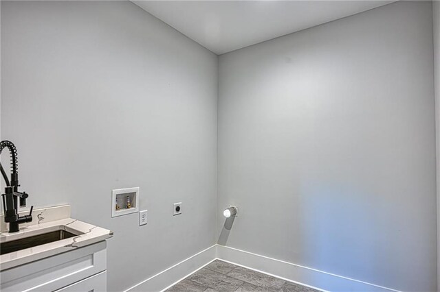 2110 Fairway Cir NE, Brookhaven, GA 30319 - washroom with hookup for an electric dryer, baseboards, cabinet space, and washer hookup