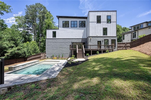 2110 Fairway Cir NE, Brookhaven, GA 30319 - rear view of property with board and batten siding, stairs, a wooden deck, and a hot tub