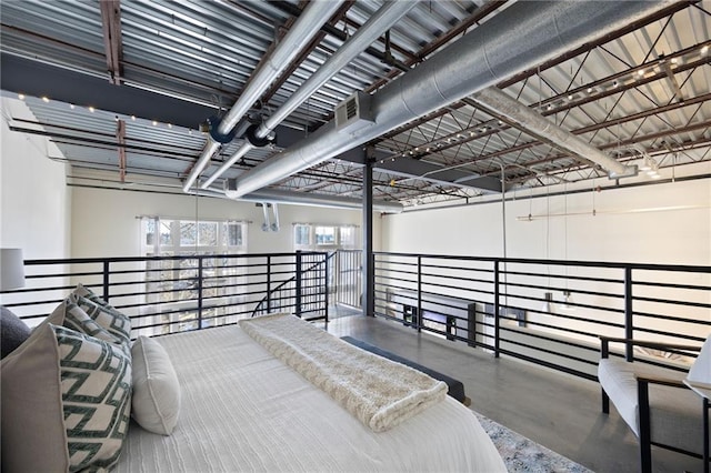 bedroom with visible vents and concrete flooring