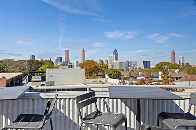 balcony featuring a city view