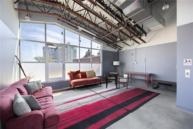 living room with concrete floors