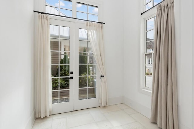 11273 Serenbe Ln, Chattahoochee Hills, GA 30268 - doorway featuring french doors, a wealth of natural light, and light tile floors