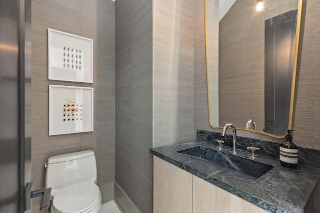 11273 Serenbe Ln, Chattahoochee Hills, GA 30268 - bathroom with tile flooring, tile walls, toilet, and vanity