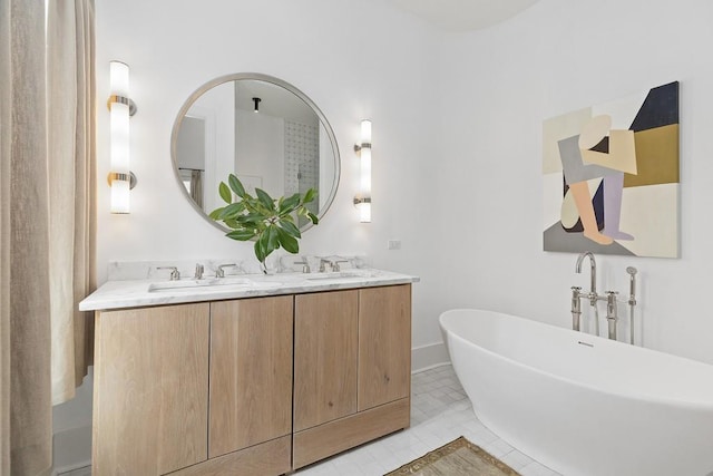 11273 Serenbe Ln, Chattahoochee Hills, GA 30268 - bathroom featuring tile flooring, double sink vanity, and a bath to relax in