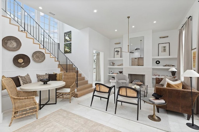 11273 Serenbe Ln, Chattahoochee Hills, GA 30268 - tiled living room featuring built in features