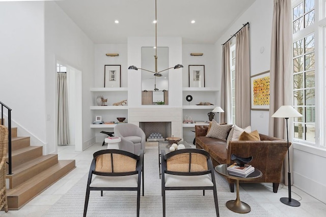 11273 Serenbe Ln, Chattahoochee Hills, GA 30268 - living area featuring built in shelves and light tile floors