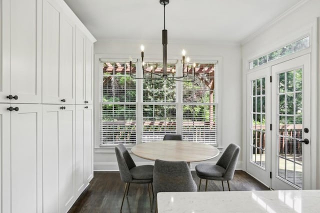 4944 Dovecote Trl, Suwanee, GA 30024 - dining area featuring a chandelier, dark wood-style floors, and crown molding
