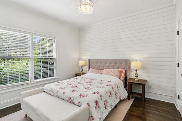 4944 Dovecote Trl, Suwanee, GA 30024 - bedroom with wood finished floors, wood walls, a chandelier, and ornamental molding