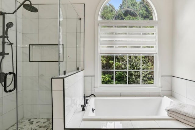 4944 Dovecote Trl, Suwanee, GA 30024 - full bathroom with plenty of natural light, a shower stall, and a bath
