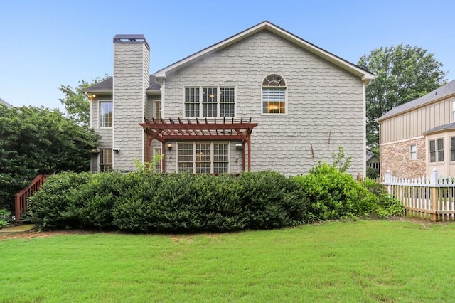 4944 Dovecote Trl, Suwanee, GA 30024 - back of property featuring a chimney and a pergola