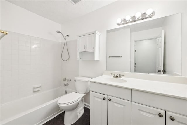 full bathroom with toilet, bathing tub / shower combination, and vanity