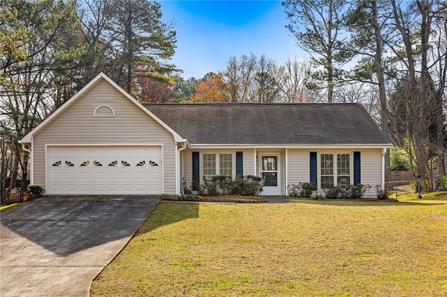 ranch-style home with a front lawn, concrete driveway, and an attached garage