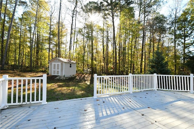 wooden deck with a shed