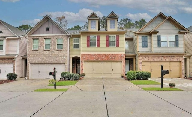 2626 Sardis Chase Ct, Buford, GA 30519 - multi unit property featuring brick siding, an attached garage, and driveway