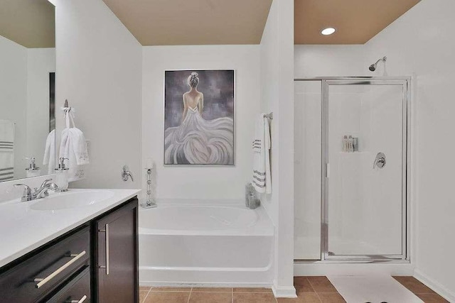 2626 Sardis Chase Ct, Buford, GA 30519 - bathroom with a stall shower, a garden tub, vanity, and tile patterned floors