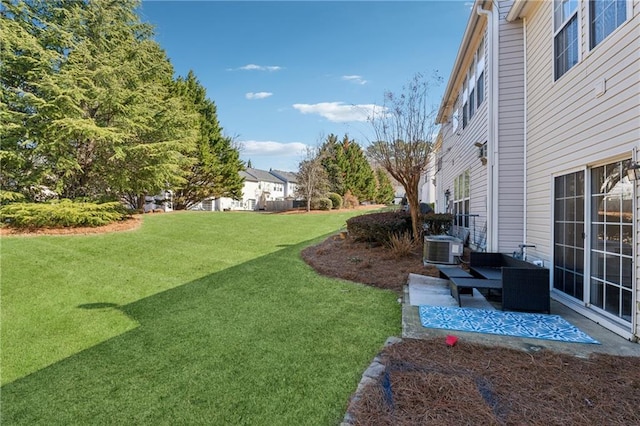 view of yard featuring a patio and cooling unit