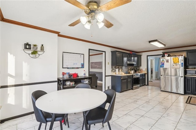 dining area with crown molding, ceiling fan, and a textured ceiling