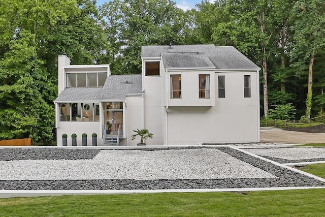 2683 Tritt Springs Trce NE, Marietta, GA 30062 - contemporary home with a shingled roof and a chimney
