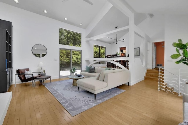 2683 Tritt Springs Trce NE, Marietta, GA 30062 - living area with high vaulted ceiling, ceiling fan, hardwood / wood-style floors, beam ceiling, and recessed lighting
