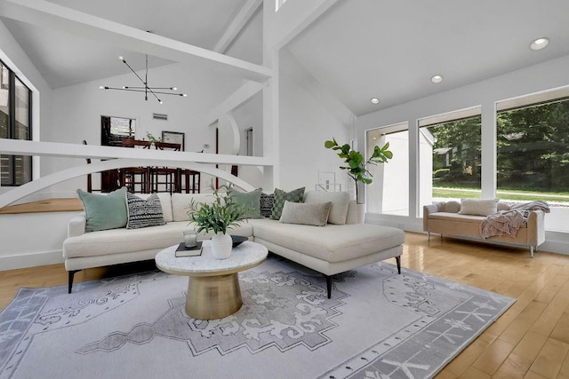 2683 Tritt Springs Trce NE, Marietta, GA 30062 - living area featuring a chandelier, high vaulted ceiling, wood finished floors, and recessed lighting