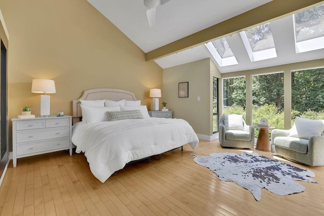 2683 Tritt Springs Trce NE, Marietta, GA 30062 - bedroom featuring a skylight, hardwood / wood-style floors, ceiling fan, and high vaulted ceiling