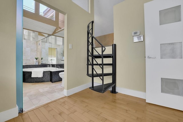 2683 Tritt Springs Trce NE, Marietta, GA 30062 - stairway with wood finished floors and baseboards