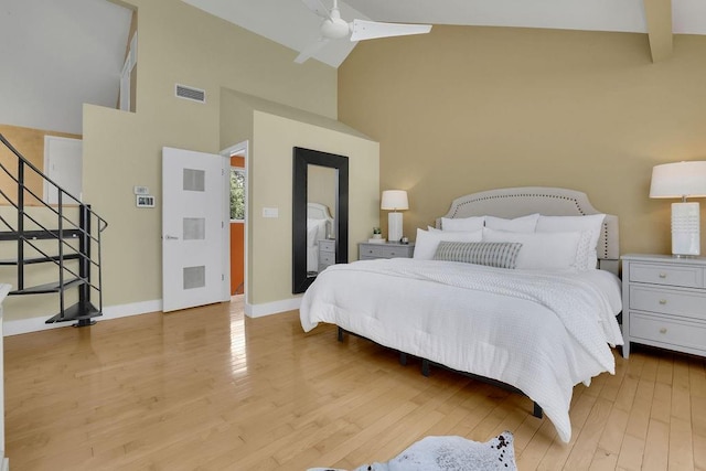 2683 Tritt Springs Trce NE, Marietta, GA 30062 - bedroom with high vaulted ceiling, wood finished floors, and ceiling fan