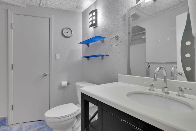 2683 Tritt Springs Trce NE, Marietta, GA 30062 - bathroom featuring vanity, a textured wall, tile patterned floors, and a drop ceiling