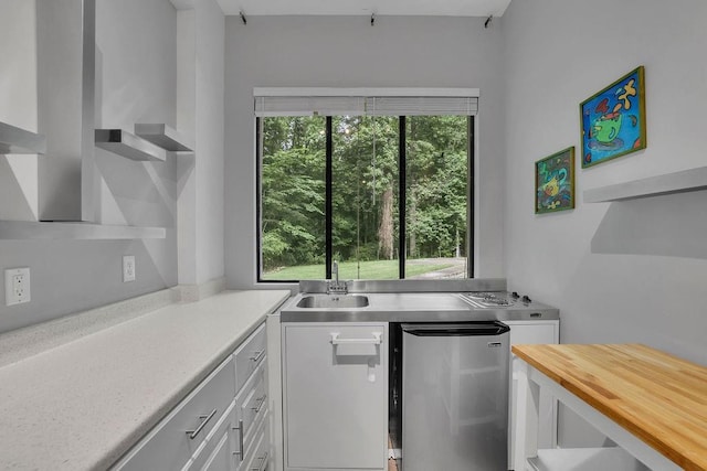 2683 Tritt Springs Trce NE, Marietta, GA 30062 - kitchen featuring stainless steel fridge, white cabinetry, open shelves, and wood counters