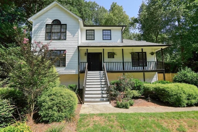 view of front of home featuring a porch and stairway