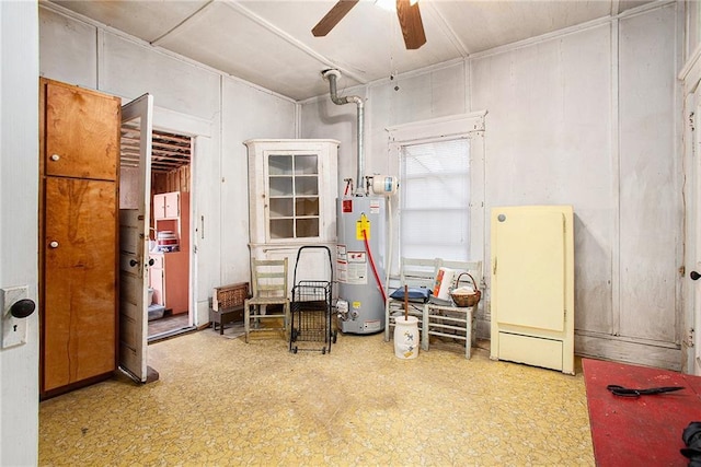 miscellaneous room featuring gas water heater and ceiling fan