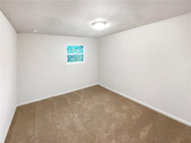 6354 Shannon Pkwy Unit 8B, Union City, GA 30291 - carpeted empty room featuring a textured ceiling and baseboards
